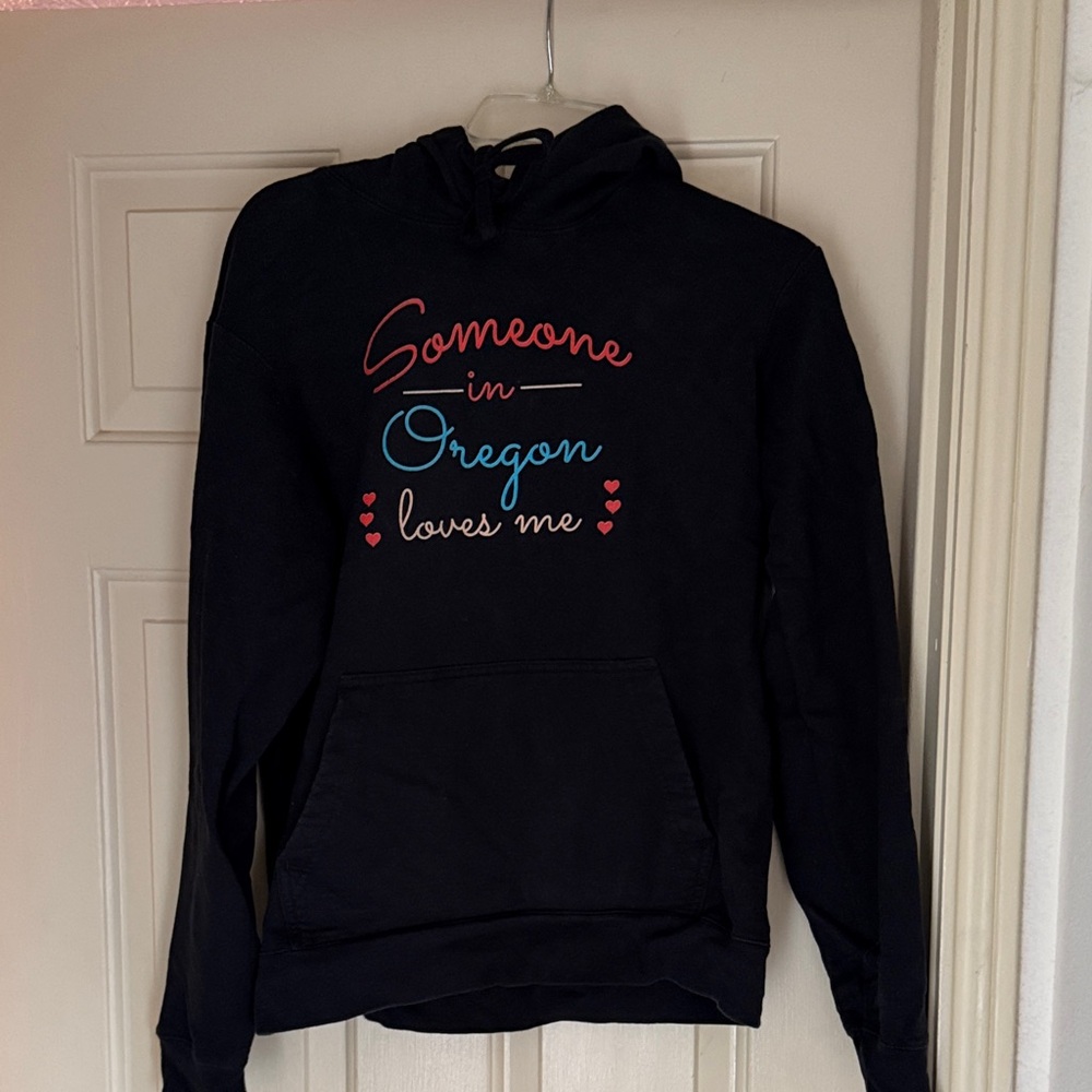 Black Hoodie with Someone In Oregon Loves Me Graphic. Size M
